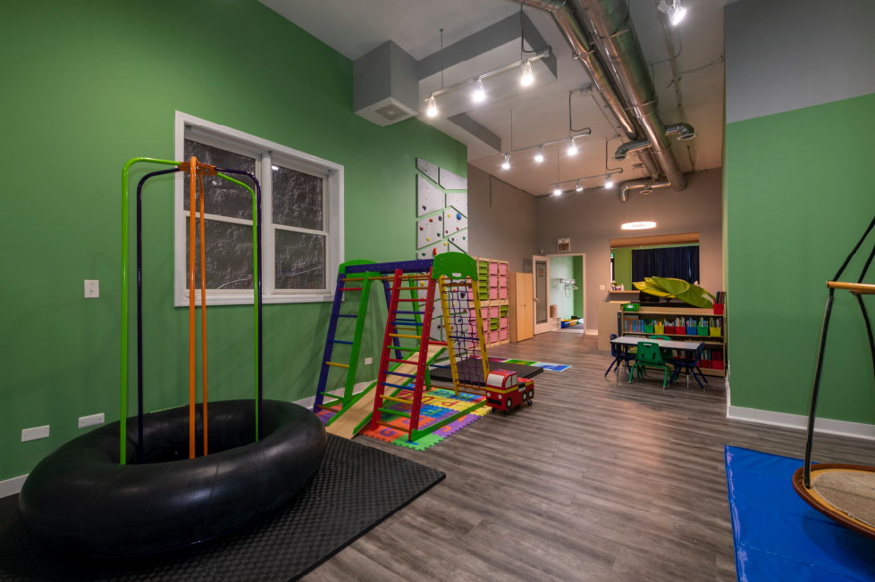 Occupational pediatric clinic Chicago Il climbing wall, low muscle tone, reduced strength, decreased coordination, motor planning, body awareness
